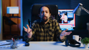 frustrated host looking at a frozen screen during a live stream